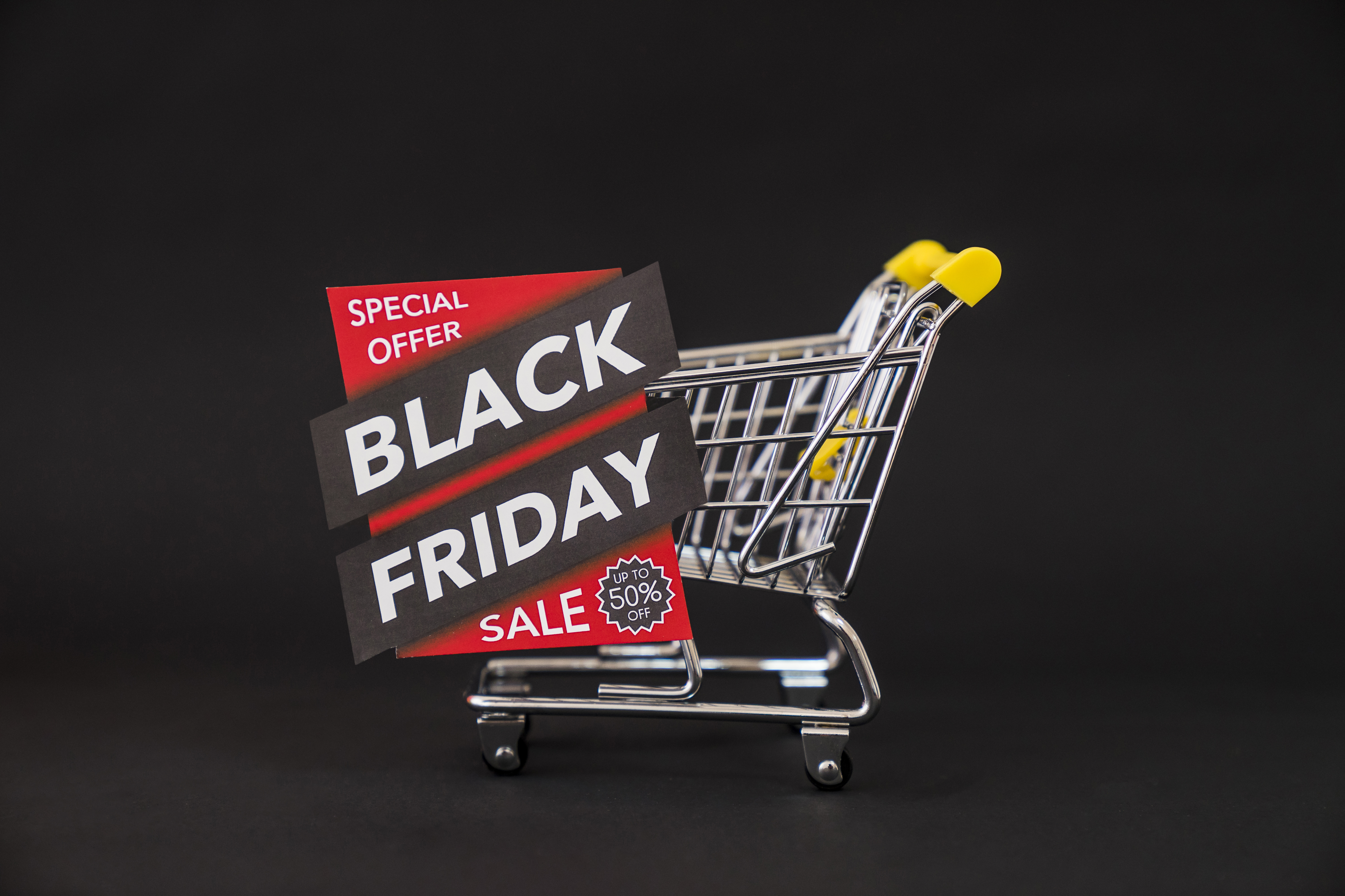 Black friday concept with label in front of cart